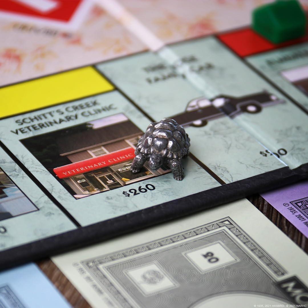 image:imageMonopoly Schitts Creek Game Tokens Include Bebe Crow Patricks Guitar Rosebud Motel Key amp More Officially Licensed and Collectible Monopoly Game Based on Award Winning Series Schitts Creek